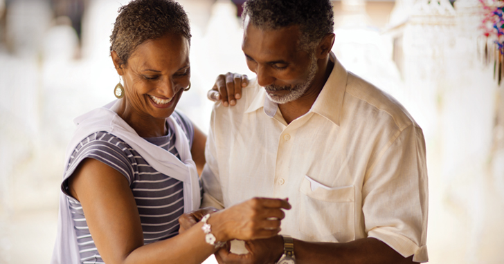 Retired couple dances together